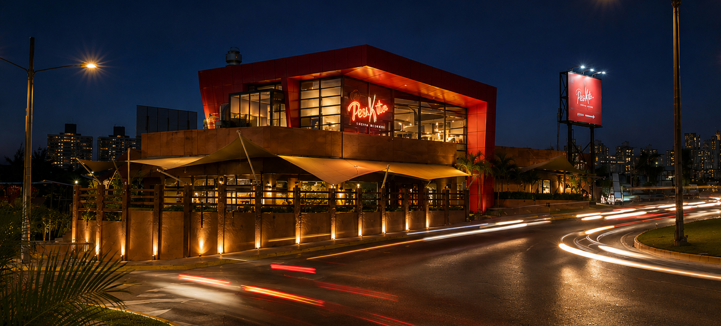 Fachada nocturna del restaurante Peskito Centennial